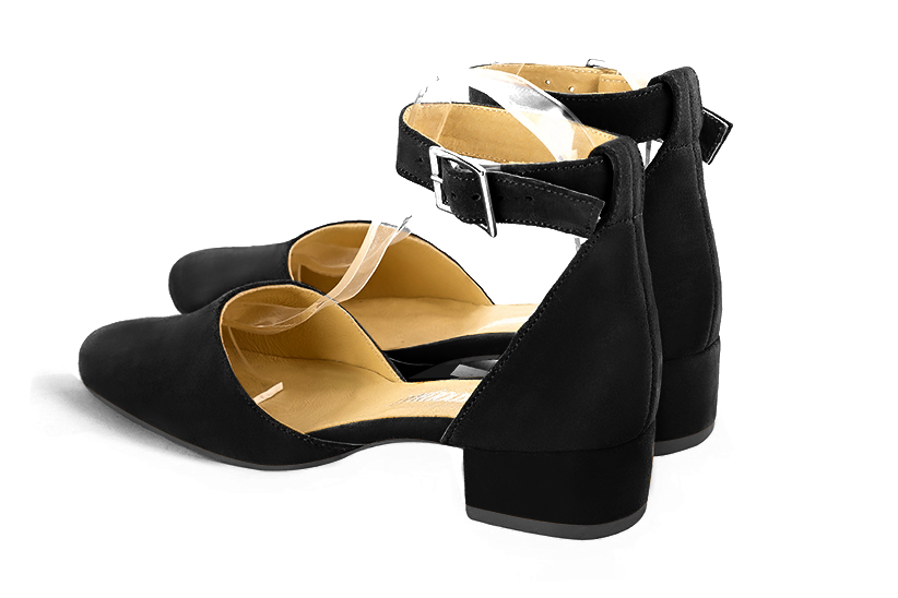 Matt black women's open side shoes, with a strap around the ankle. Round toe. Low block heels. Rear view - Florence KOOIJMAN